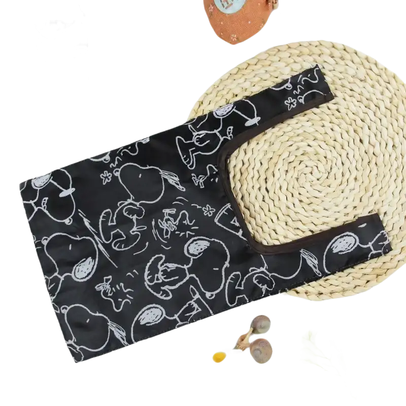 Black Snoopy-patterned reusable shopping bag.