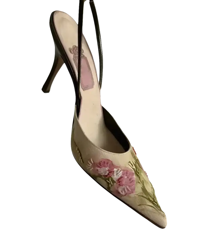 Floral embroidered slingback heel.