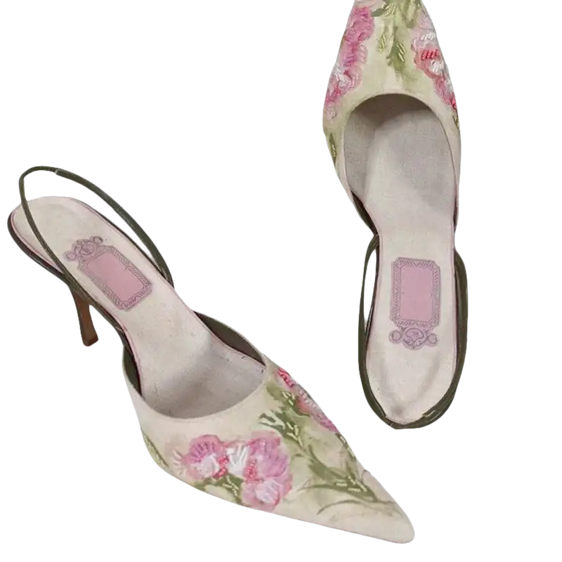 Floral embroidered slingback heels.