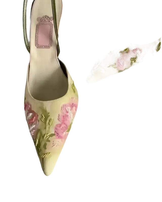 Floral embroidered pointed-toe slingback heels.
