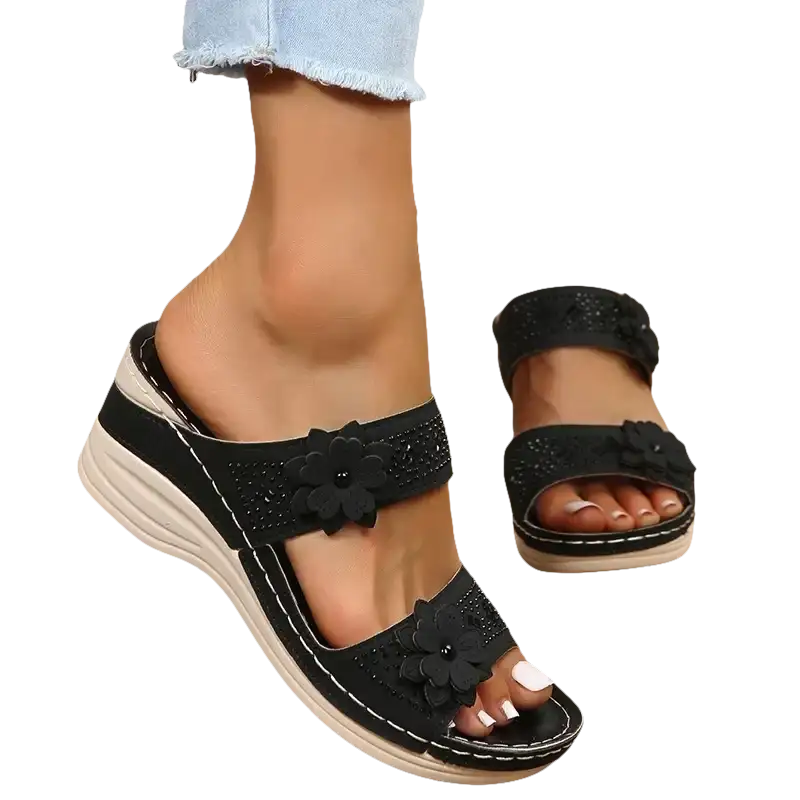 Black floral wedge sandals.