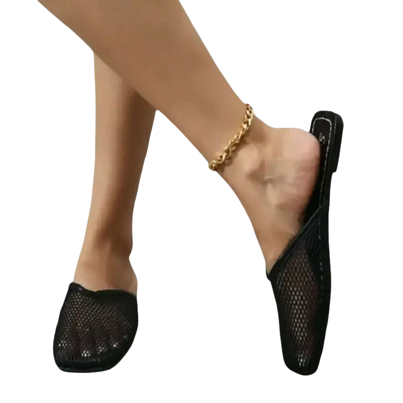 Black mesh mule shoes.