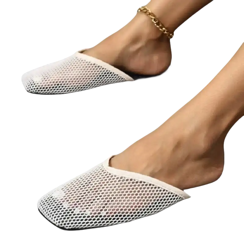 White mesh slip-on shoes.