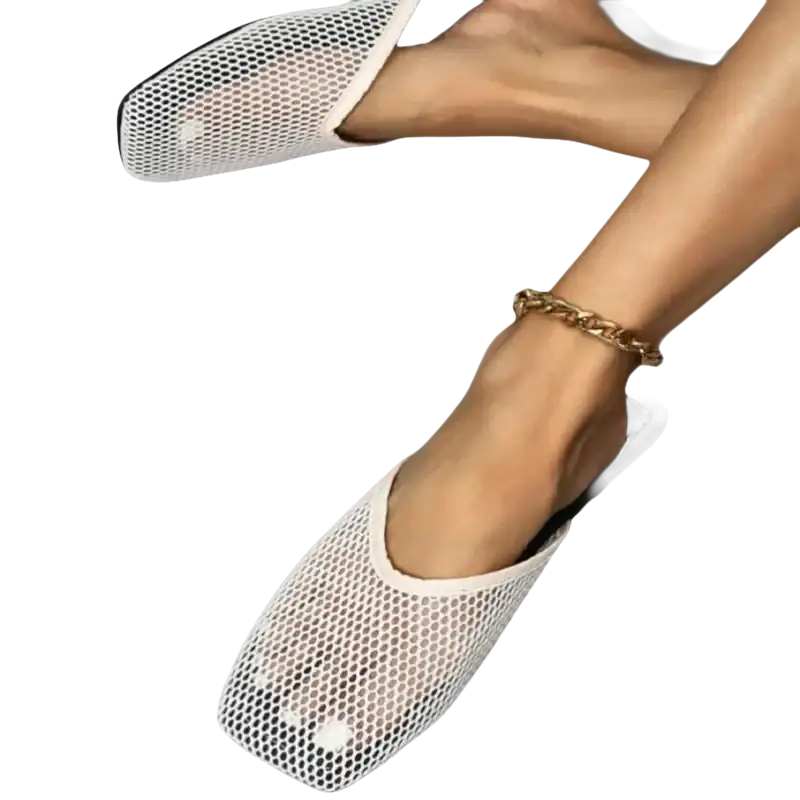 White mesh slip-on shoes.