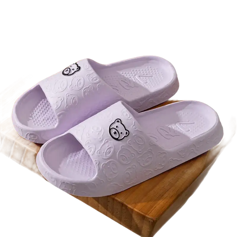 Lavender bear-themed slide sandals.