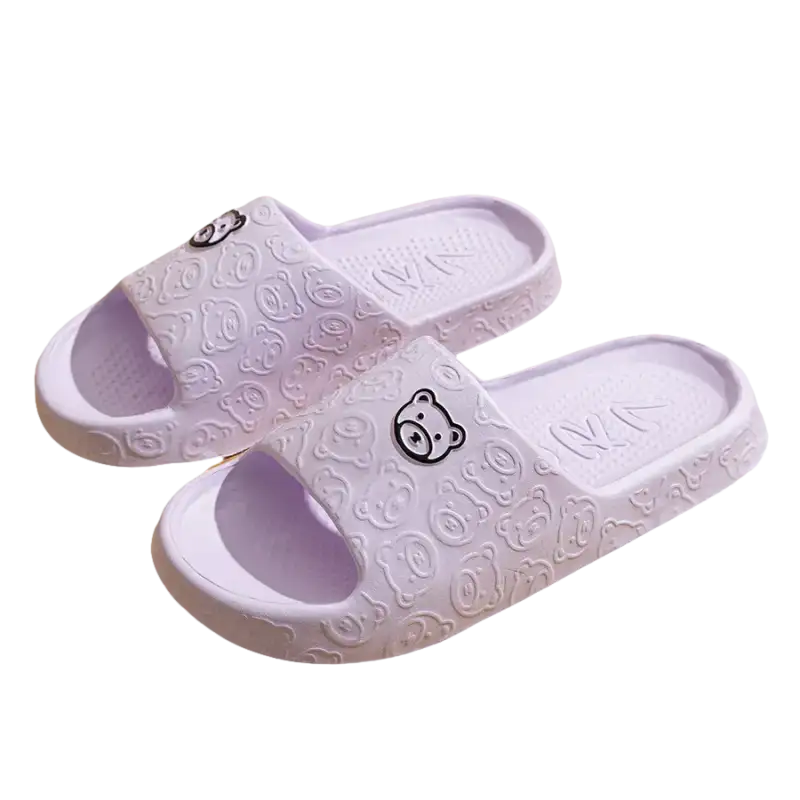Lavender bear-themed slide sandals.