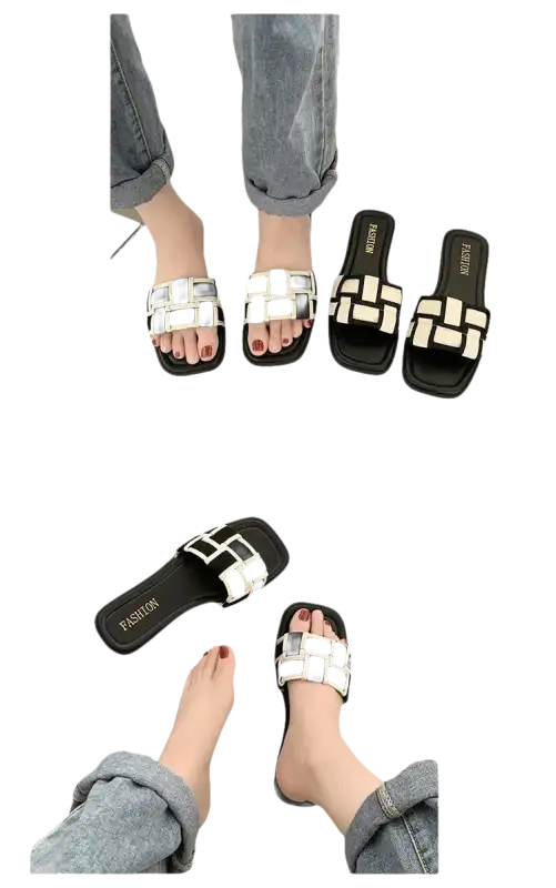Black and white woven slide sandals.