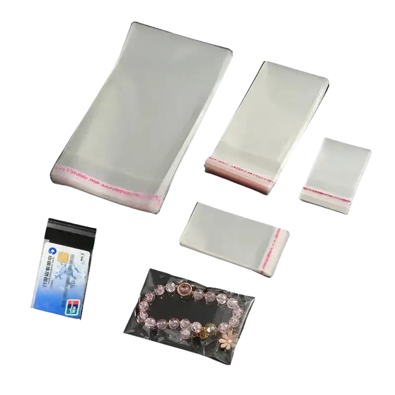 Clear plastic bags with adhesive strips.