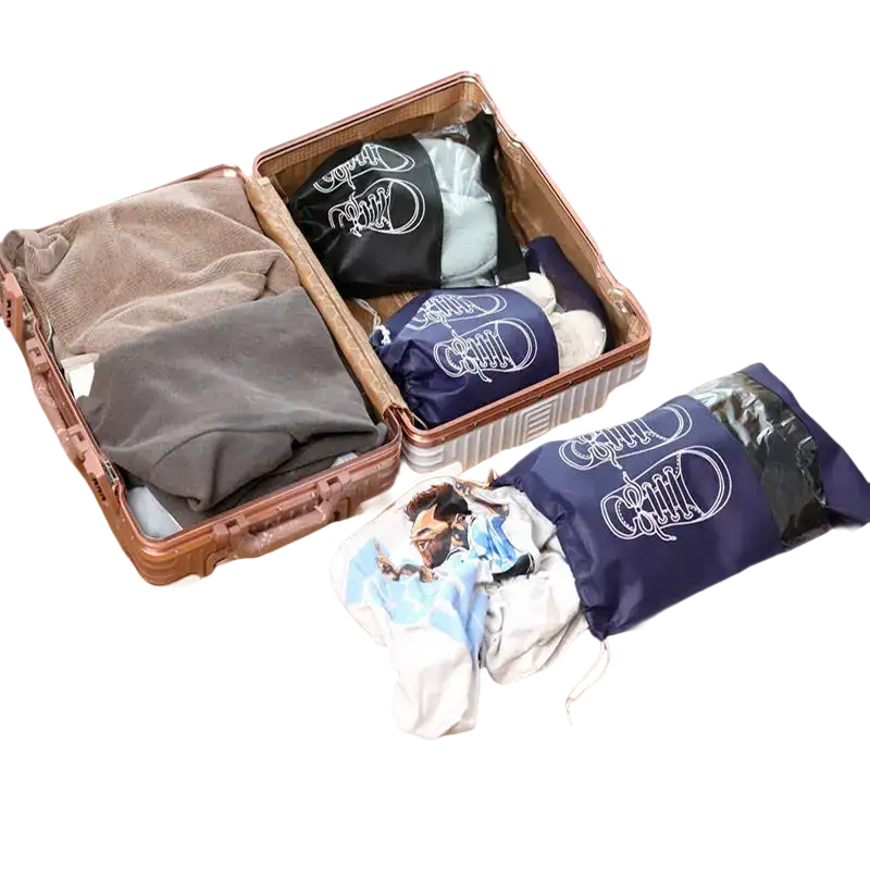 Open suitcase with packing bags.