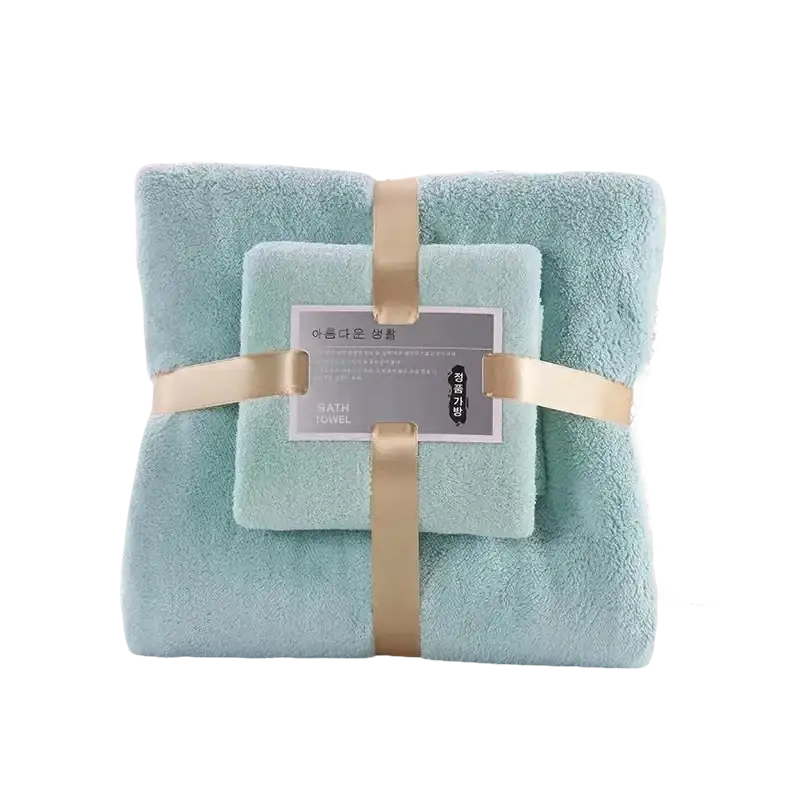 Stacked trendy coral bath set towels with ribbon, super absorbent and soft