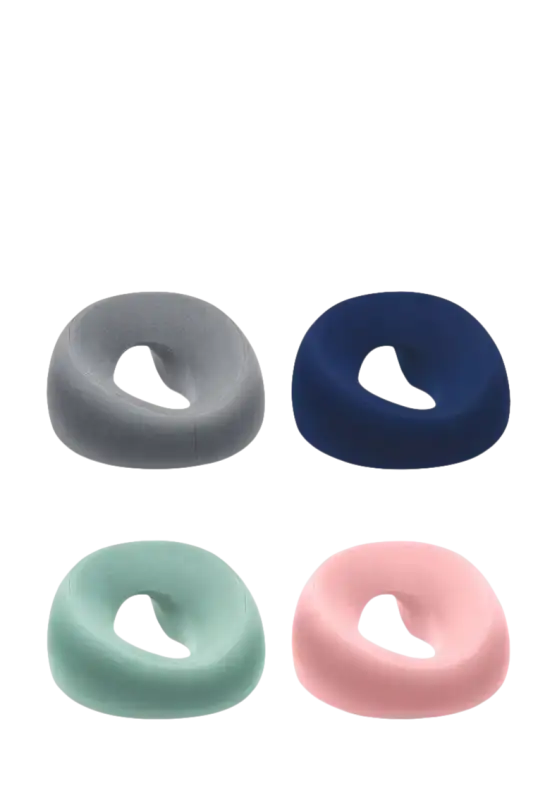 Colorful donut-shaped cushions for Ergoluxe Memory Foam Beauty Pillow for comfortable ergonomics lying