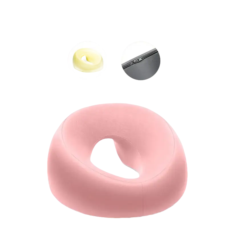 Pink donut-shaped foam beauty pillow from Ergoluxe Memory Foam for ergonomic lying