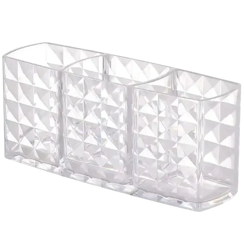 Clear faceted three-compartment organizer for trendy Diamond Chic Bathroom with patterned mirror cabinet
