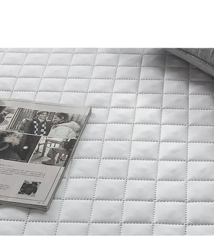 Quilted mattress protector.