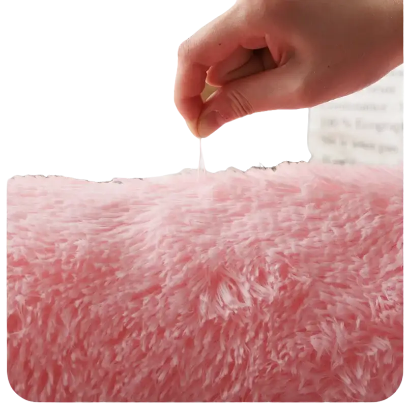Soft pink shag rug.