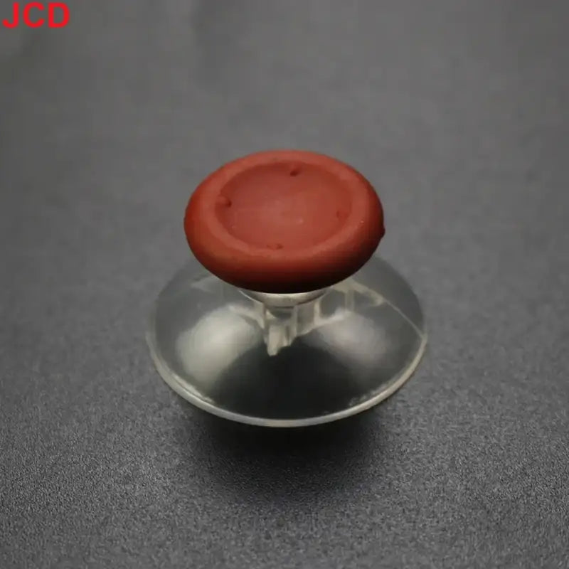 Red and clear suction cup.