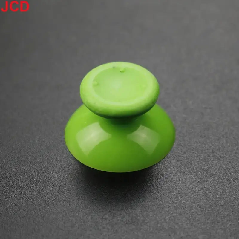Green joystick thumbstick.
