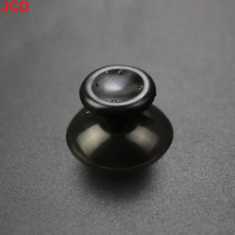 Black joystick thumbstick.