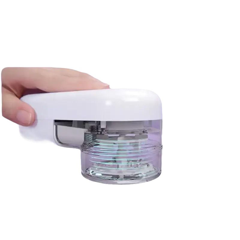 White electric lint remover.