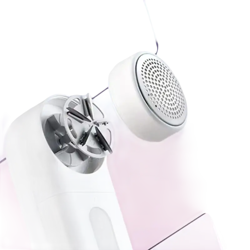 White lint remover with exposed blades.