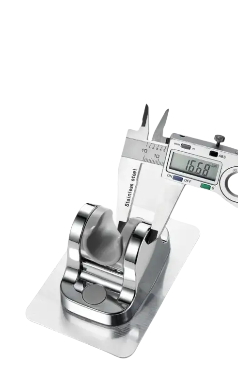 Chrome shower head holder being measured.