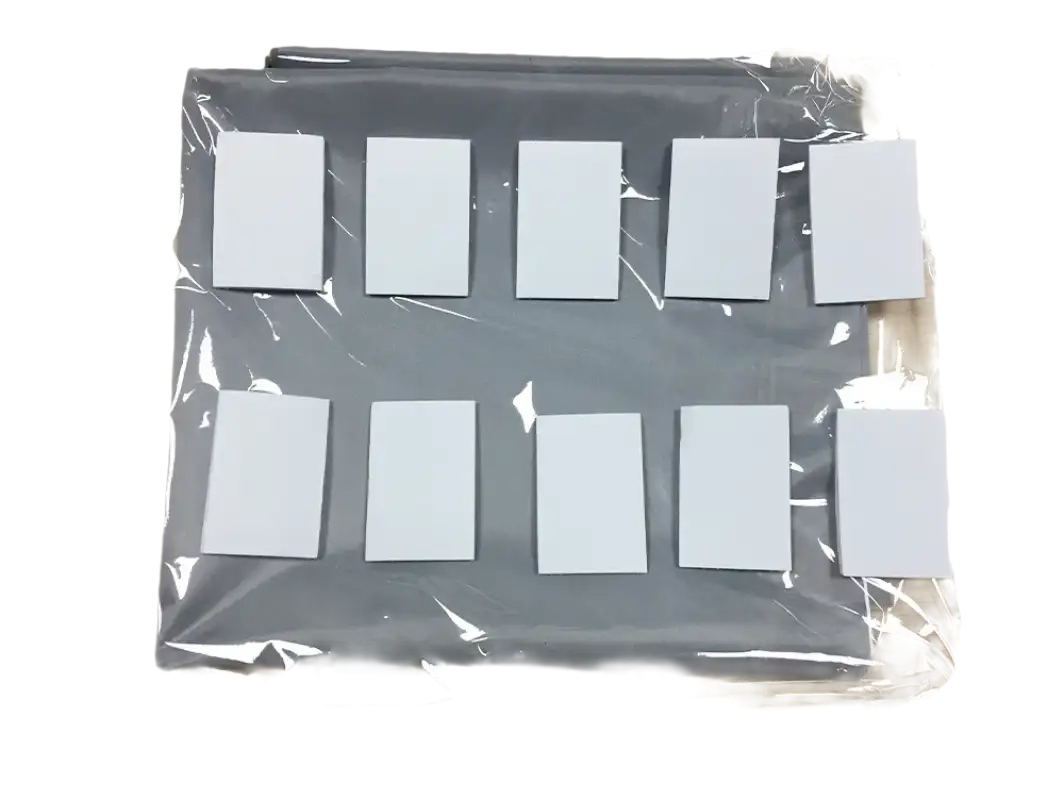Gray storage organizer with white labels in plastic packaging.