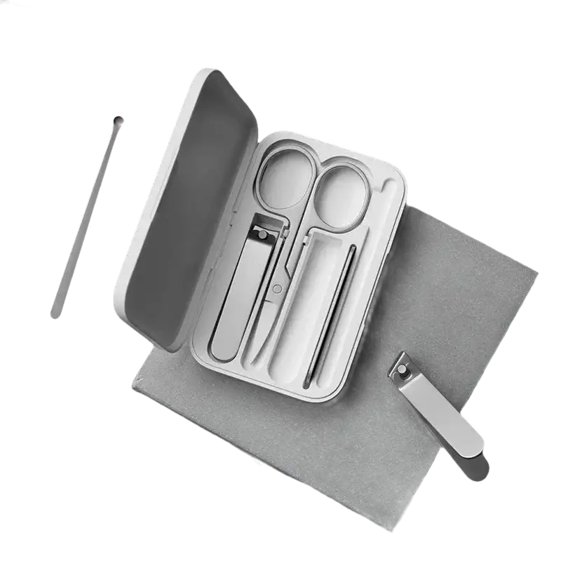 Silver manicure set in a white case.