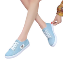 Light blue canvas sneakers.