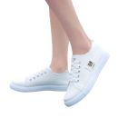 White canvas sneakers.