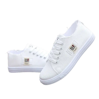 Pair of white canvas sneakers.