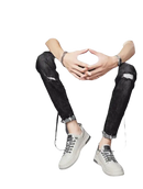 Man in black ripped jeans and gray sneakers.