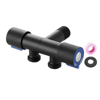 Black metal water valve with accessories.