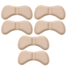 Beige shoe heel cushions.