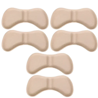 Beige shoe heel cushions.