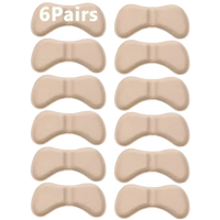 Beige shoe heel cushion pads.