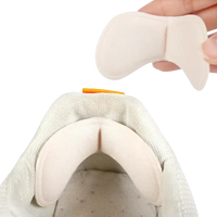 Beige anti-drop heel pads.