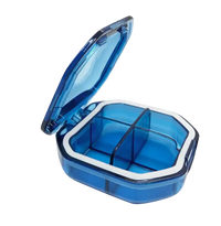 Blue plastic pill organizer with dimensions.