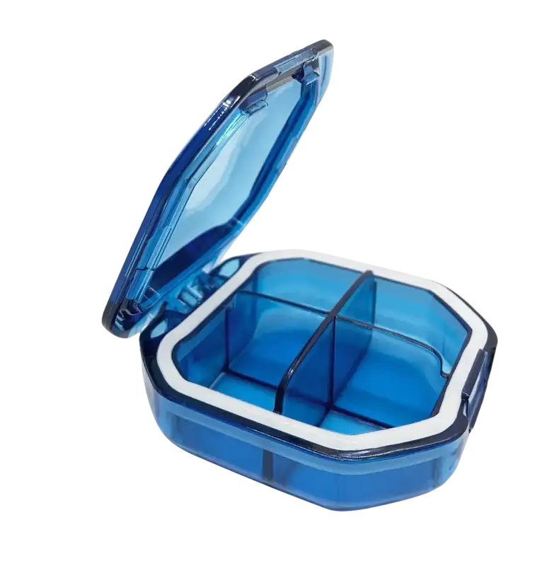 Blue plastic pill organizer with dimensions.