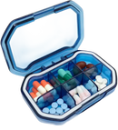 Blue pill organizer with various medications.