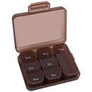 Brown plastic pill organizer.