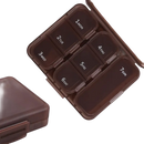 Brown weekly pill organizer.