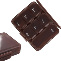 Brown weekly pill organizer.