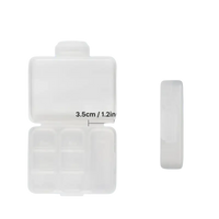 White plastic pill organizer with dimensions.