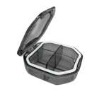 Open gray pill organizer with dimensions.