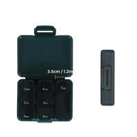 Dark green pill organizer with dimensions.