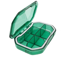 Green plastic six-compartment container.