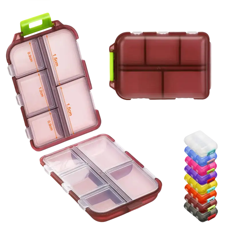 Maroon plastic pill organizer.