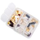 Pill organizer filled with various pills.