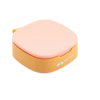 Peach and yellow pill box with dimensions.