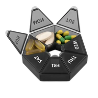 Seven-compartment pill organizer with various pills.